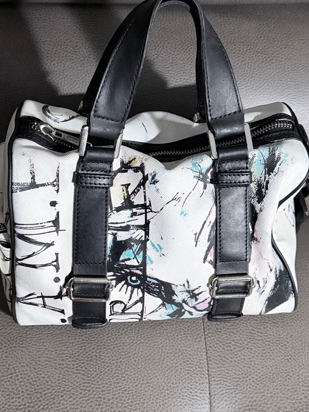 L.A.M.B. White StreetStyle Mini Duffel with Black Leather Trim